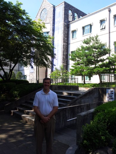 In front of the Theology Department Building, where my office is located.